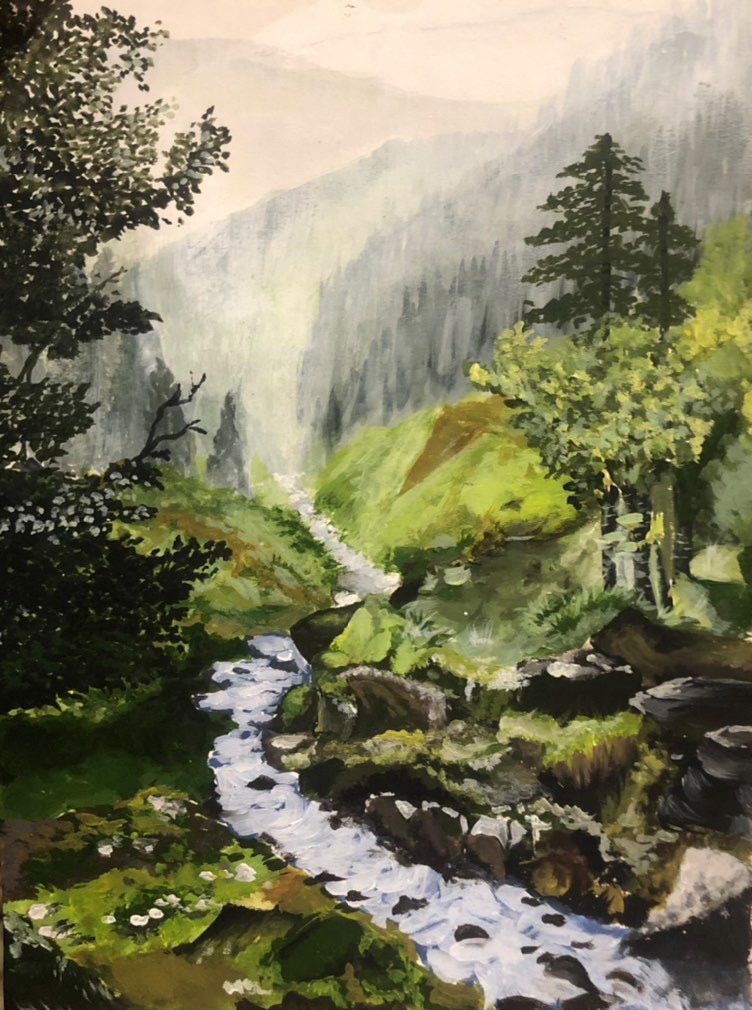 A painted mountain stream winding through a green valley